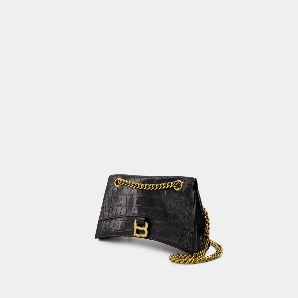 BALENCIAGA CRUSH CHAIN SMALL BAG IN CROCODILE-EMBOSSED LEATHER.? DIMENSIONS: L24.9 X H14 X W7.9 CM.? 49.8 CM LONG CHAIN SHOULDER STRAP.? CURVILINEAR BOTTOM.? AGED GOLD FINISH.? STUDDED MAGNET
