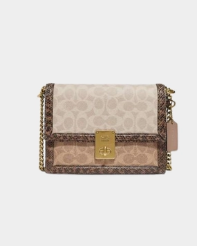 COACH HUTTON SHOULDER BAG IN BLOCKED SIGNATURE CANVAS WITH SNAKESKIN DETAIL