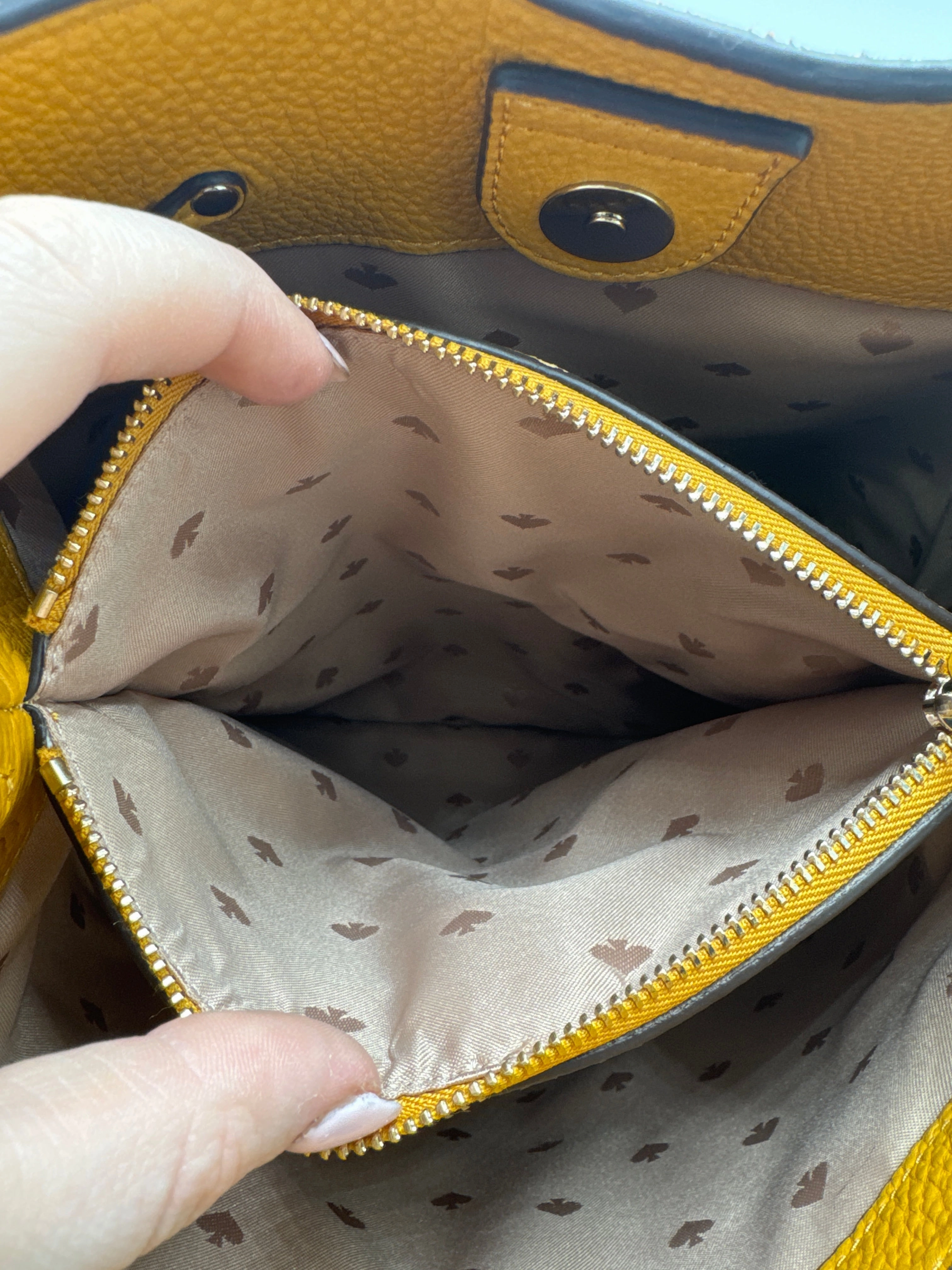 Handbag Designer By Kate Spade
