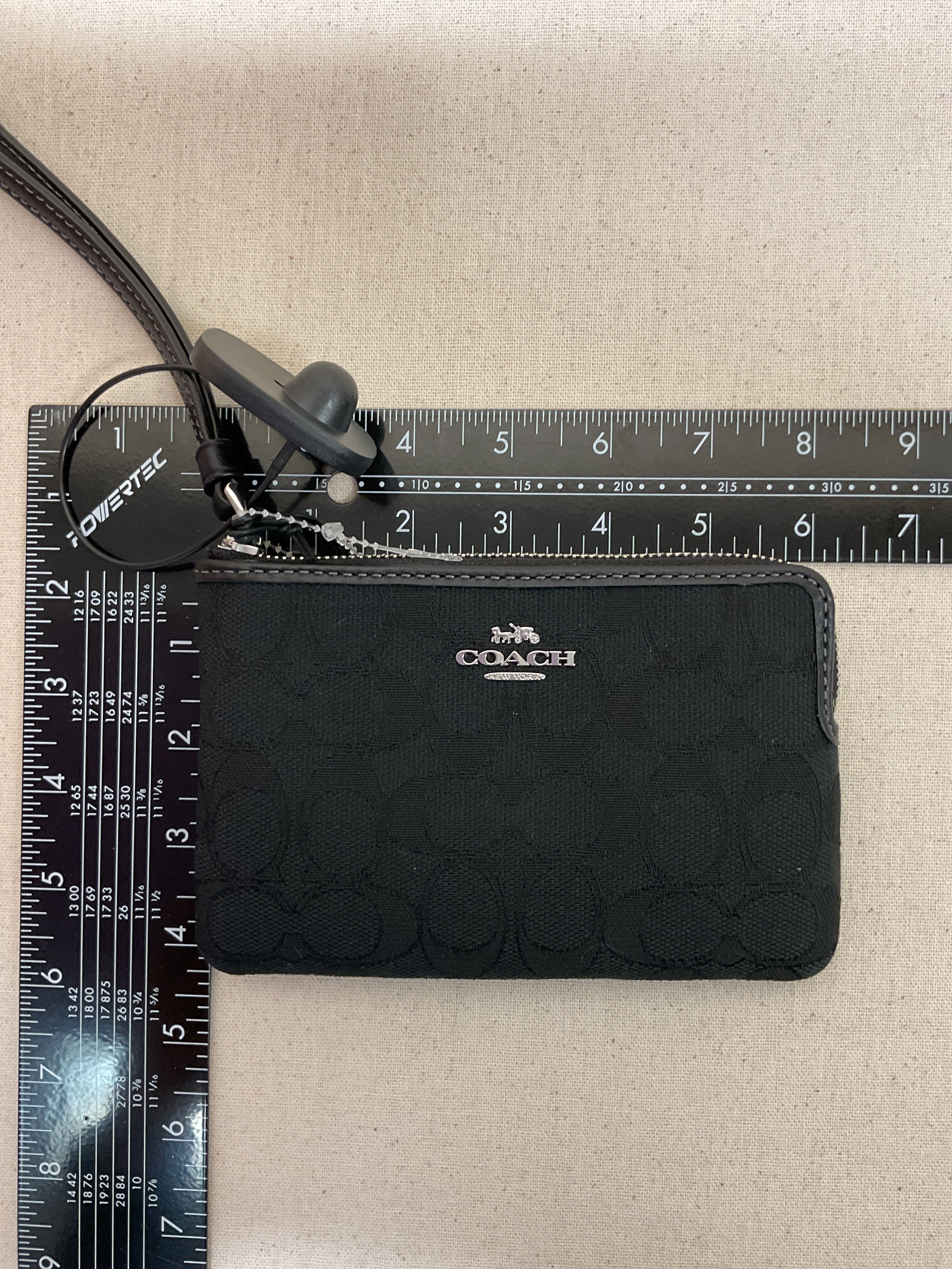 Wristlet Designer By Coach In Black, Size:Medium